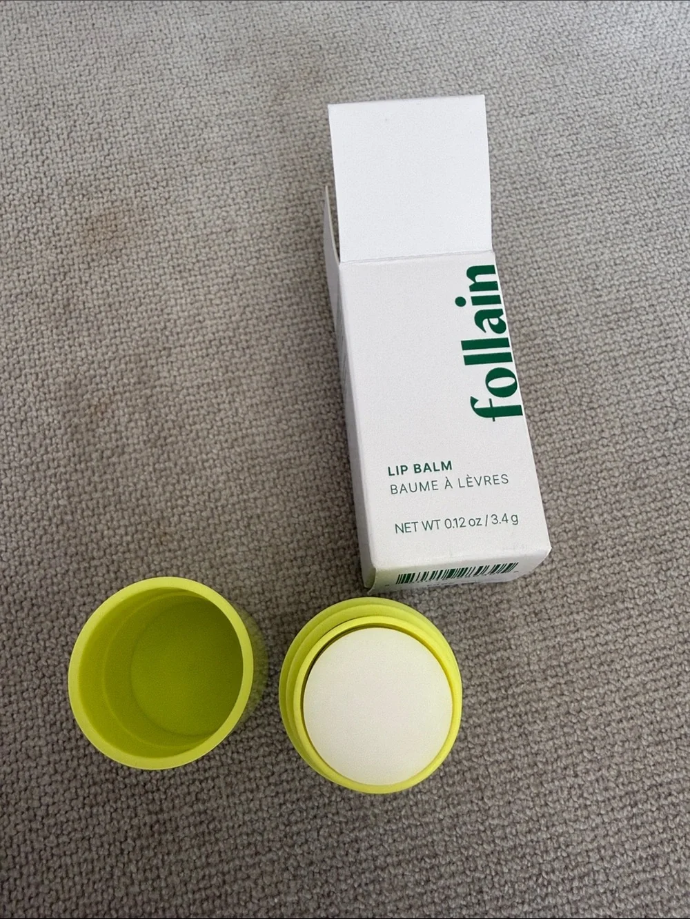 REVOLVE Follain Lip Balm in Neon Yellow-Green
